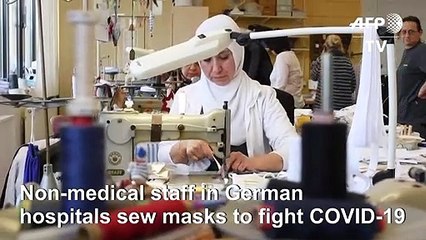 Germany: Non-medical staff sew masks in hospital as coronavirus cases soar