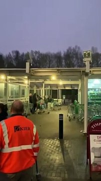 Shoppers queue outside ASDA - before store has even opened