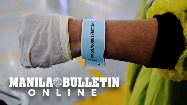 Coronavirus Hong Kong airport arrivals slapped with quarantine wristbands