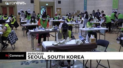Volunteers in South Korea bid to help by making face masks