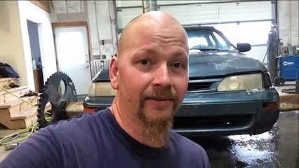 Car Modified With Wheels That Are Steel Gears