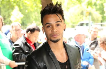 Aston Merrygold delays wedding