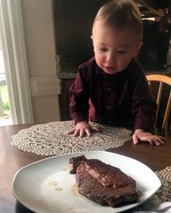 Toddler Cries When Mom Takes Away the Steak He Tires to Grab
