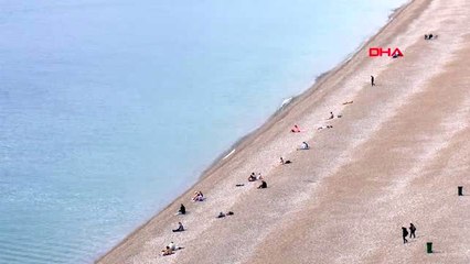 ANTALYA KONYALTI SAHİLİ GÜNE BÖYLE BAŞLADI