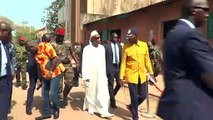 Guinea President Condé votes in referendum as protesters clash with police