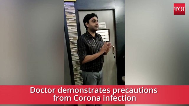 COVID-19: Doctor Demonstrates Precautions From Corona Infection
