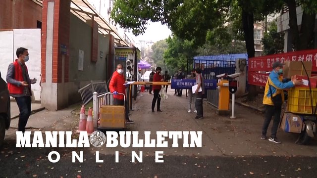 Back to work in China virus epicentre as restrictions eased