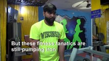 Delhi's rebel gym-goers risk virus to pump iron
