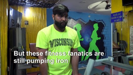 Delhi's rebel gym-goers risk virus to pump iron