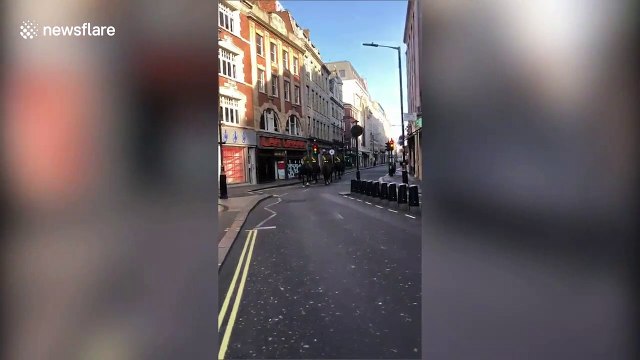 Mounted patrols seen on deserted London streets on first day of lockdown