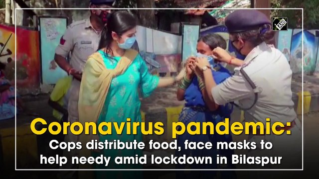 Coronavirus pandemic: Cops distribute food, face masks to help needy amid lockdown