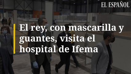 El rey, con mascarilla y guantes, visita el hospital de Ifema.