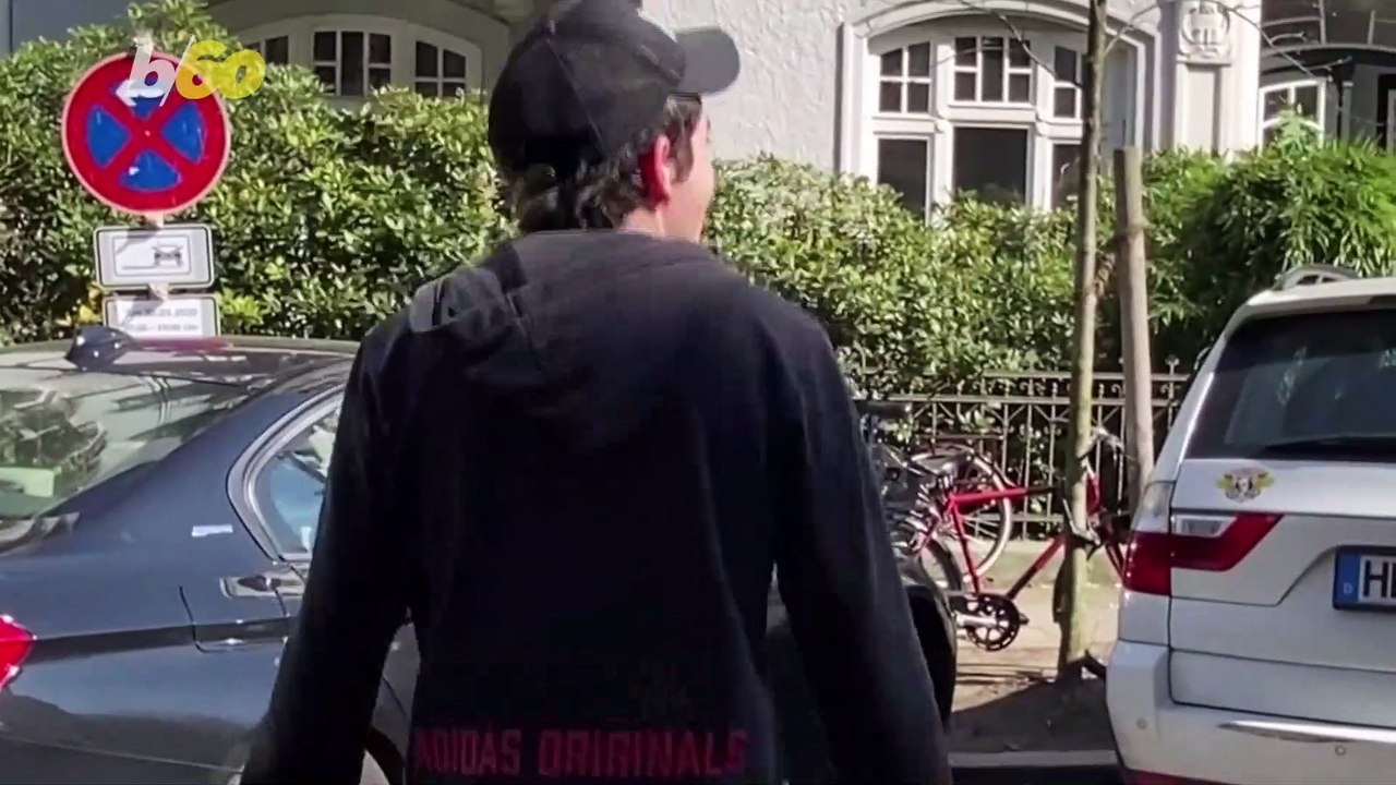 Residents Exercise on Balconies as Fitness Trainer Hosts Street Workout Session