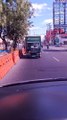 Truck Seemingly Drives in Reverse Down Street