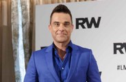 Robbie Williams reignites feud with 'd***head' Liam Gallagher