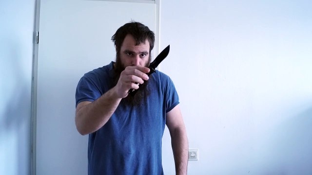 A black, Tac-Force stainless steel folding knife