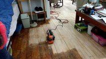 Me Belt Sanding a Floor