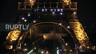 France- 'Stay at home' and 'thank you' messages projected on Eiffel Tower