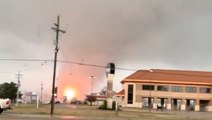 Large tornado sends sparks flying from damaged power line