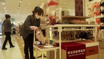 Reabren lo centros comerciales en Wuhan