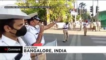 Indian police wear coronavirus helmets to spread lockdown message