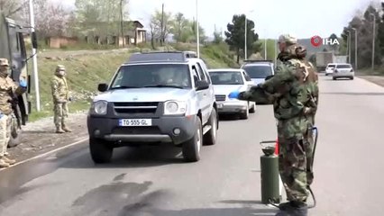 - Gürcistan'da korona virüse karşı önlemler arttırılıyor- Şehirlerin girişlerinde kontrol noktaları...