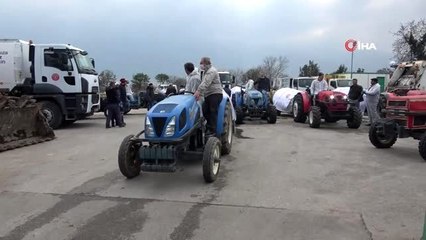 Bütün ilçeyi traktörleriyle dezenfekte ettiler