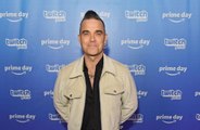 Robbie Williams não vê fantasmas desde que se tornou pai