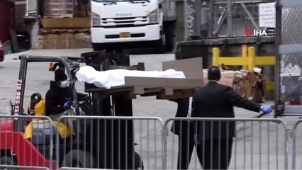 - ABD'de, korona virüsünden hayatını kaybedenler soğutucu tırlarla taşınıyor