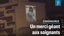 Paris : des photos de soignants projetées en grand sur une façade d'immeuble