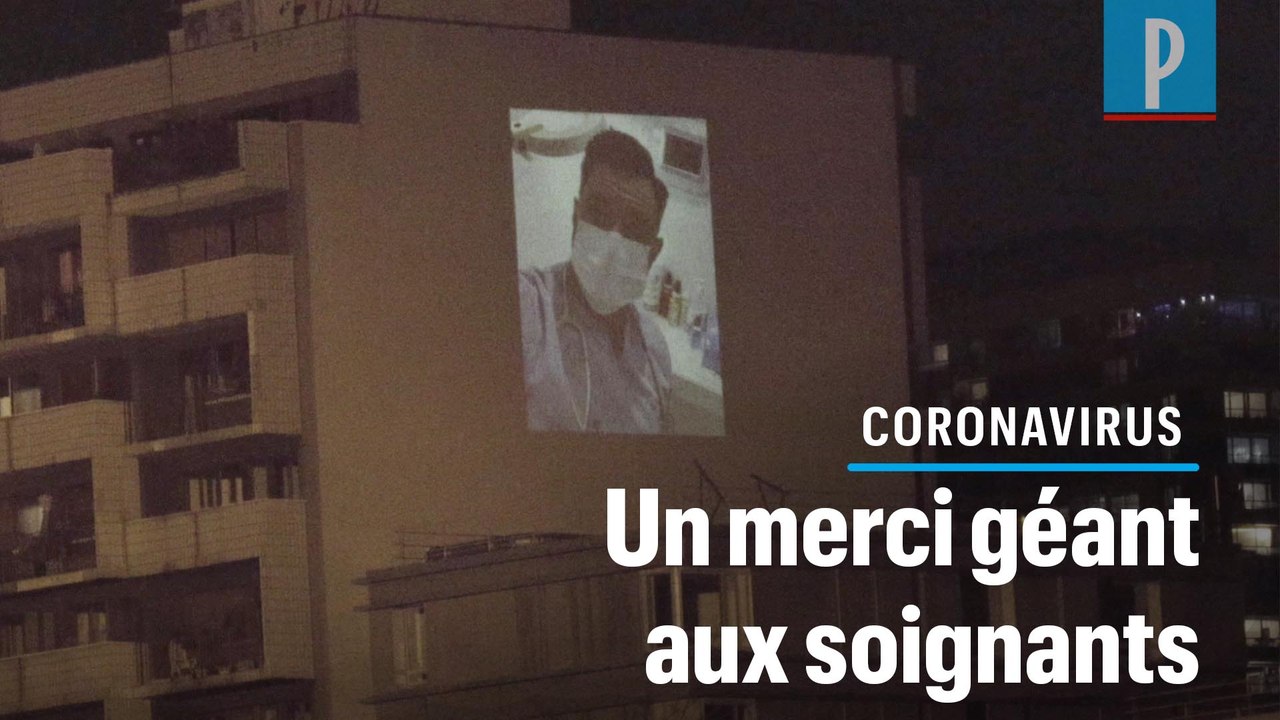 Paris : des photos de soignants projetées en grand sur une façade d'immeuble