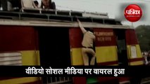कलाबाजी करने के लिए ट्रेन की तारों के ऊपर चढ़ा युवक, वीडियो देखकर लोग हैरान