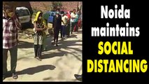 Social distancing maintained during ration distribution