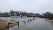Floodwaters bury roads in Massachusetts