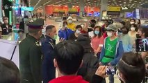 Chaos at Bangkok airport as returning Thailand residents REFUSE to go into quarantine