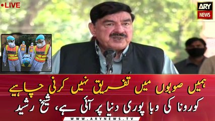 Minister for Railways Sheikh Rasheed Ahmed talks to media