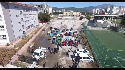 Kozanlı çiftçiler, ilçeyi traktörleriyle dezenfekte etti