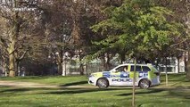 Police try to enforce social distancing in Hyde Park in London during coronavirus lockdown
