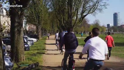 Many Germans enjoy sunny weather outdoors despite coronavirus warnings