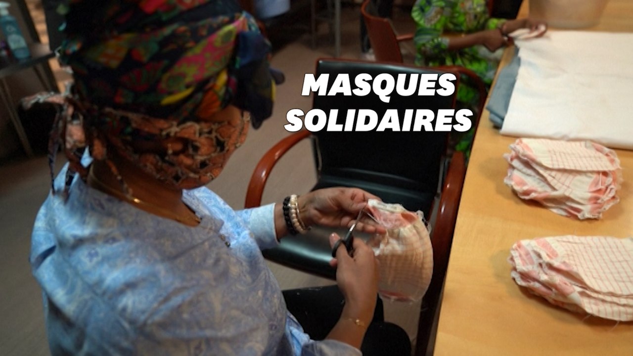 Contre le Covid-19, des sans-papiers fabriquent des masques en tissu