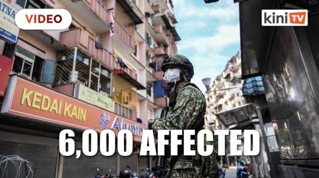 16 people per unit: Two packed buildings in KL placed under lockdown
