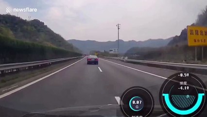 Loose bumper flies into car windshield, almost hitting driver in China