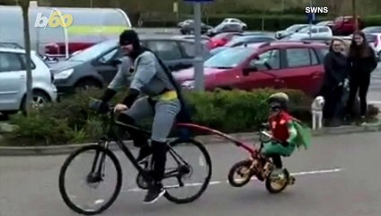 Holy Mackerel! Batman and Robin are Spotted Bicycling Outside a Local U.K. Supermarket