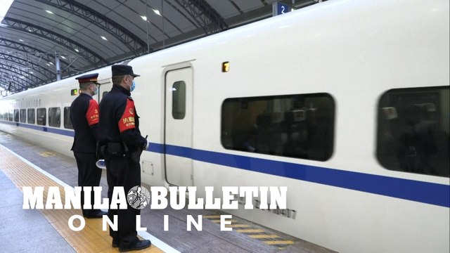 Wuhan residents at train station as city exit ban lifted