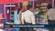 Polisi Sosialisasi Penggunaan Masker Ke Masyarakat