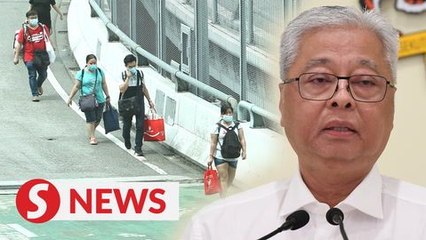 Video herunterladen: Govt working with S'pore to handle influx of M'sians returning home after island republic lockdown