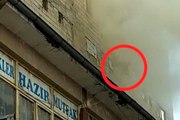 Yangında mahsur kalan hamile kadın pencereden böyle atladı