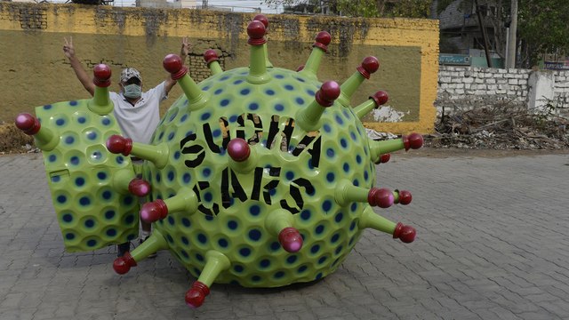 Coronavirus-shaped car spreads awareness during India’s lockdown