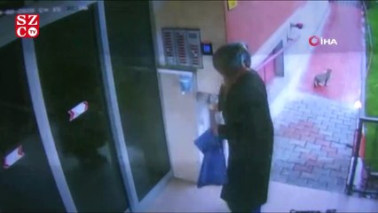 Elindeki sıvıyı asansör ve kapılara süren kadın yakalandı