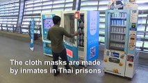 Vending machines distribute face masks made by Thailand convicts